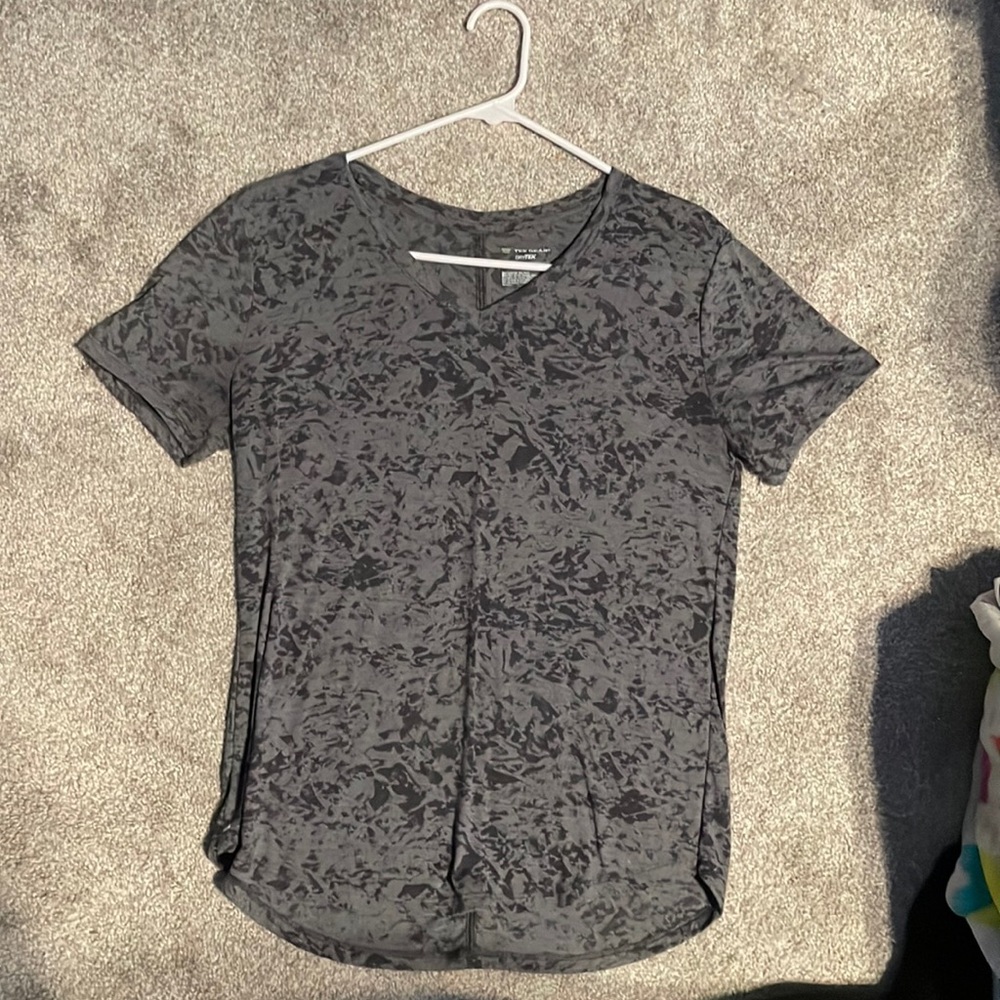 Spotted black and grey athletic shirt.